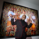 Kehinde Wiley stands in front of his painting during the Puma-Kehinde Wiley vernissage on Jan. 20, 2010, in Berlin.
Andreas Rentz/Getty Images for PUMA